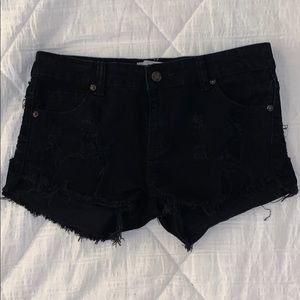 Black distressed shorts